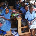 Delpeche students with new school kits, 2017.