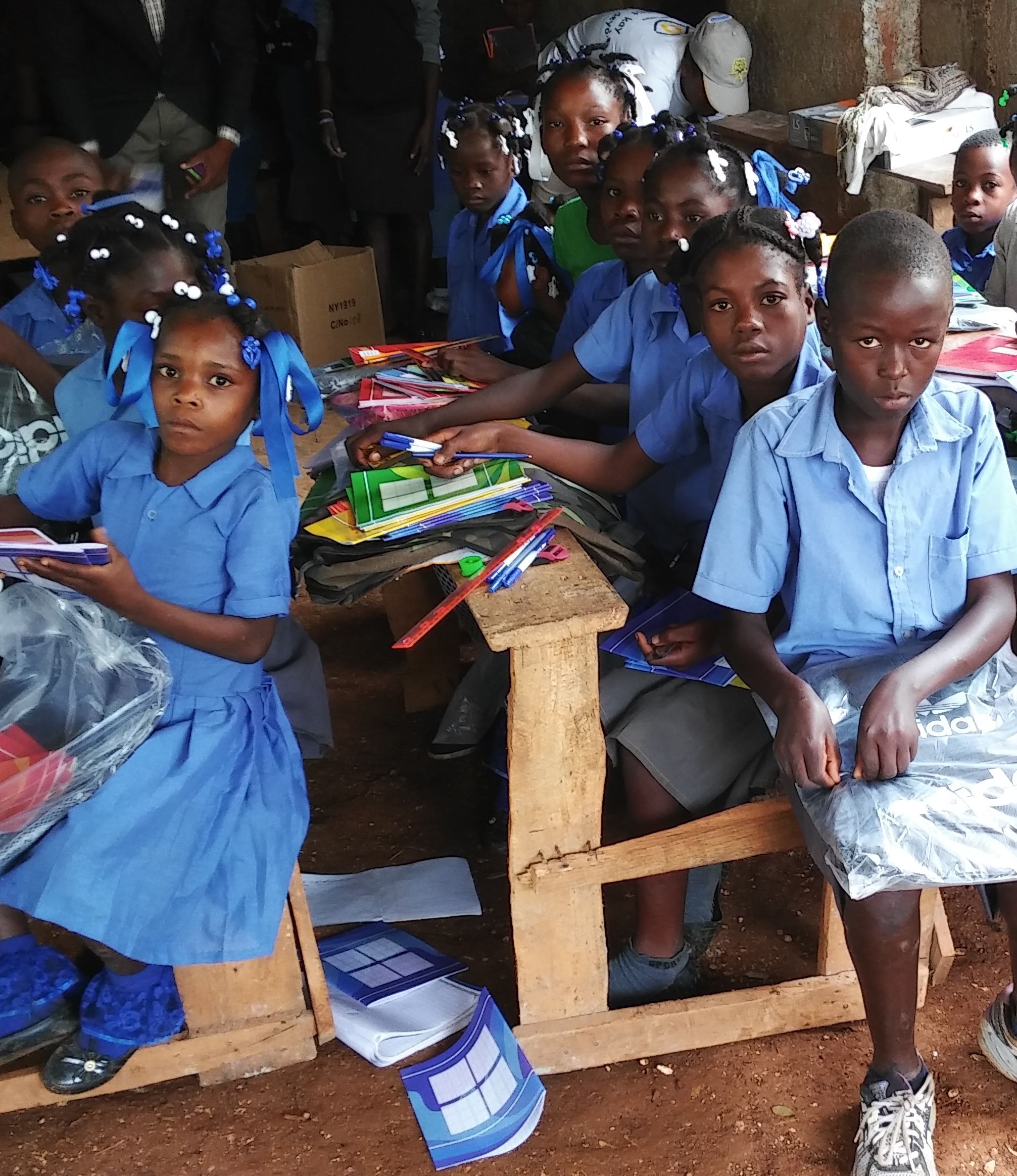 Delpeche students with new school kits, 2017.
