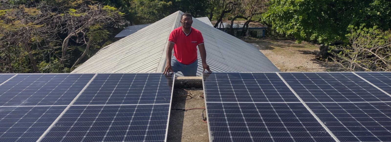 Peniel on rooftop at Cote Plage.